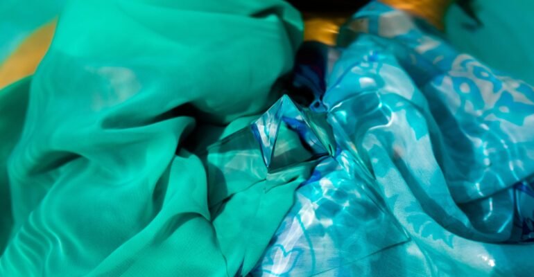 cropped-image-woman-holding-prism-swimming-pool-min